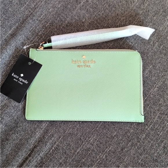 kate spade Handbags - Kate Spade IZip Saffiano Leather Beach Glass
NWT
Wristlet, NWT